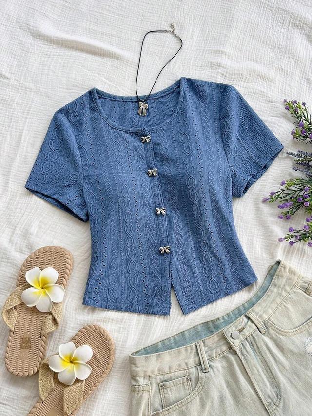 blue schiffli metallic bow short sleeve top