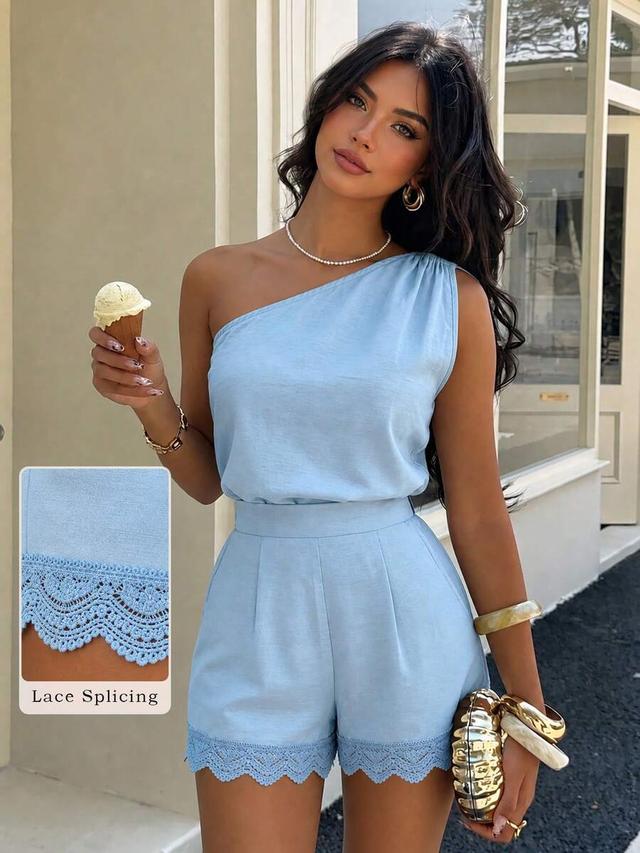 light blue one-shoulder top and matching lace-trim shorts