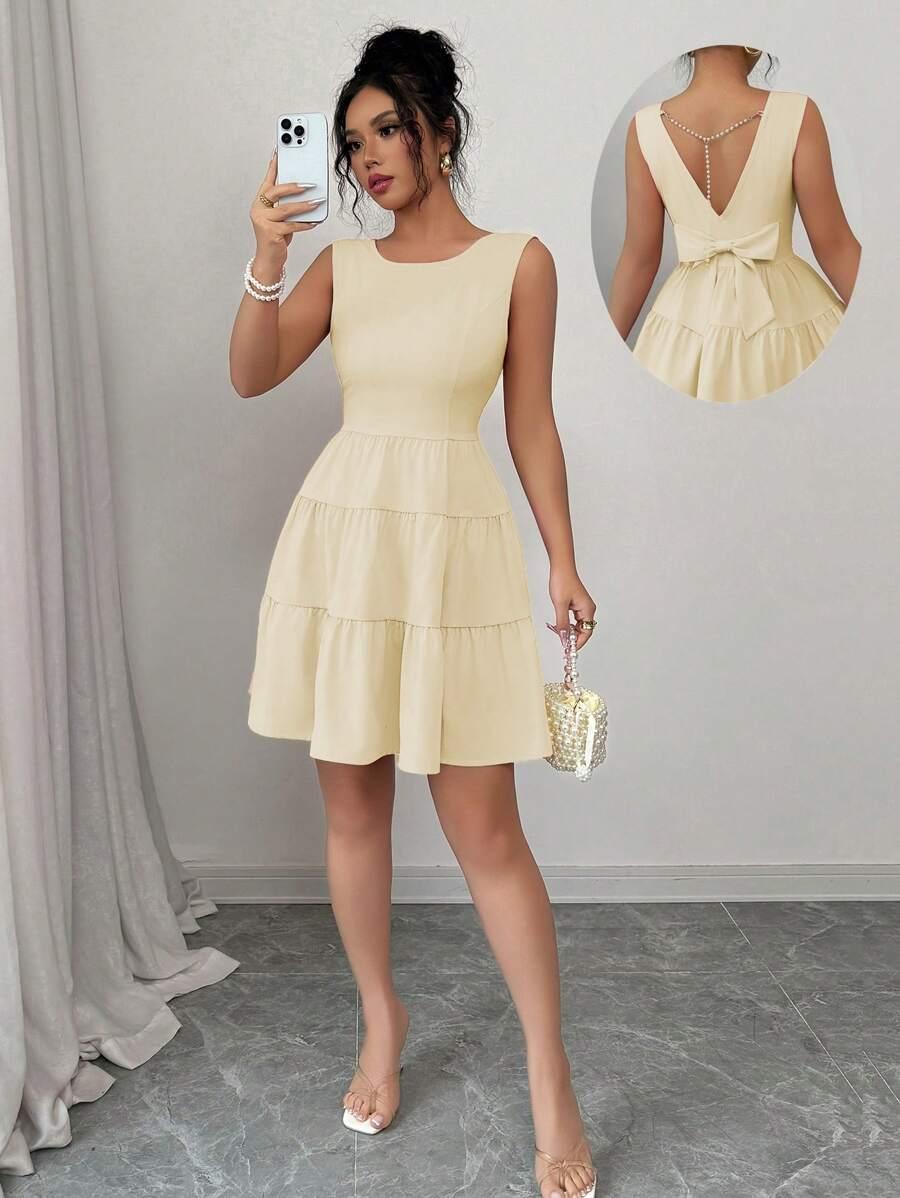 solid color bowknot decorated sleeveless tiered dress