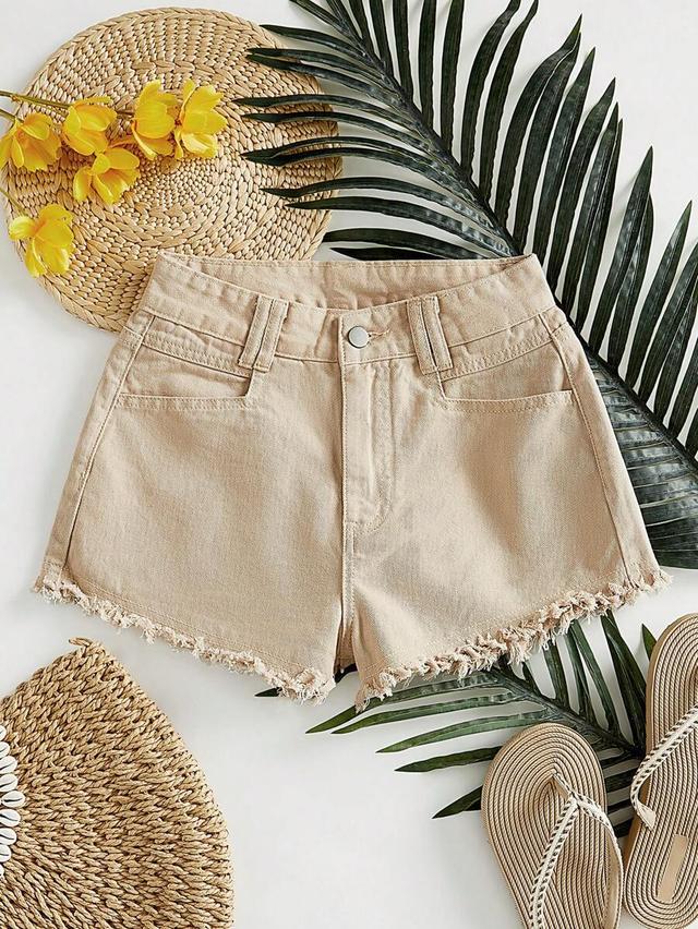 beige denim shorts with raw fringe hem