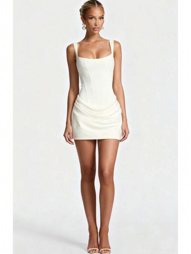 ivory corset style mini dress with draped skirt