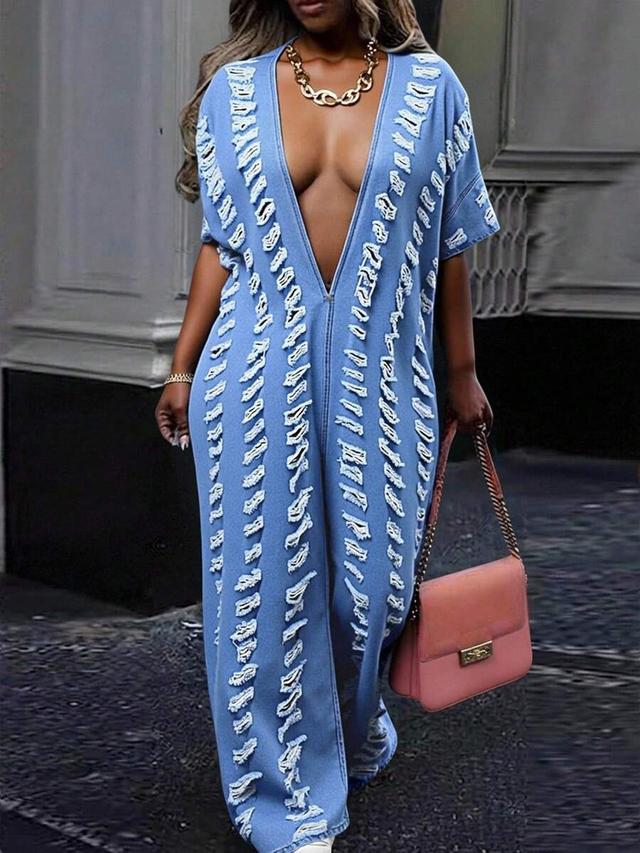 distressed light wash denim jumpsuit with deep v-neck