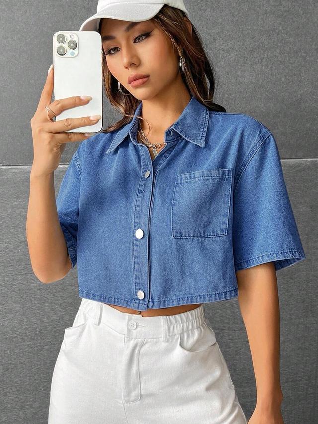 cropped blue denim short sleeve button up shirt