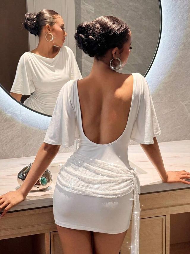 elegant white batwing-sleeved mini dress with rhinestone waist