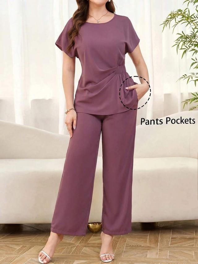 purple solid color batwing top and wide leg trousers