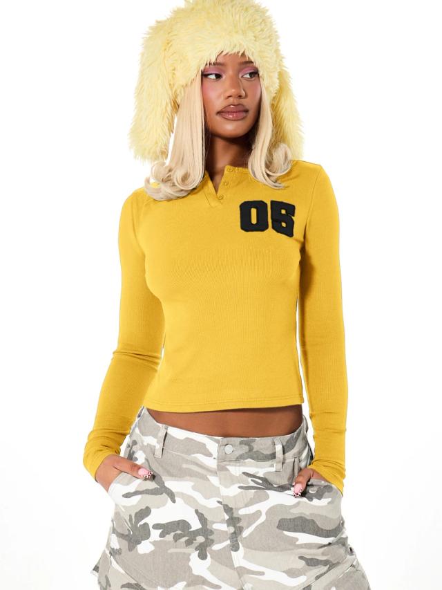 ribbed long sleeve polo top with number print