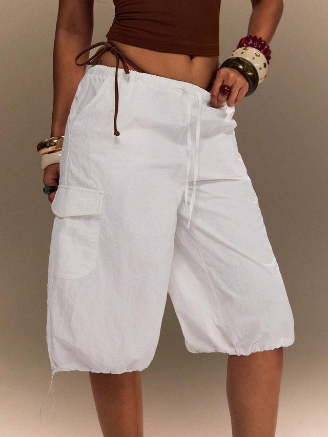 white cotton cargo shorts with drawstring hem