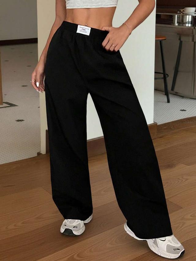 black straight-leg baggy casual trousers