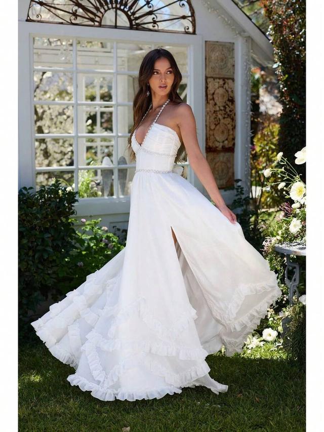 white strapless corset dress with ruffled hem and pearl trim