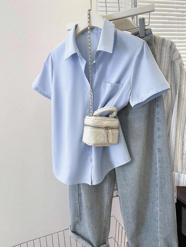 light blue short sleeve button-down casual shirt
