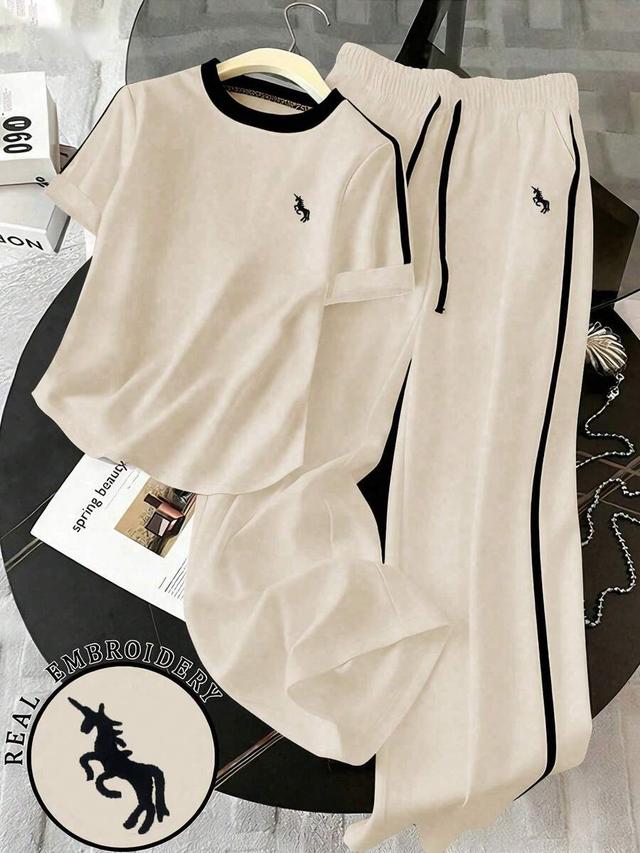 beige embroidered contrast trim t-shirt and wide leg pants