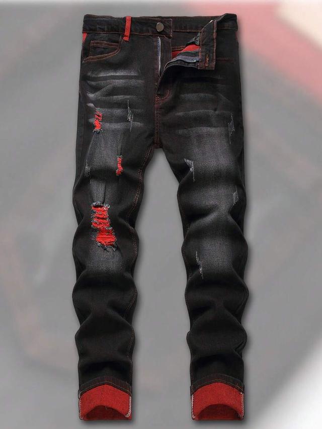 men's black ripped jeans with red contrast stitching