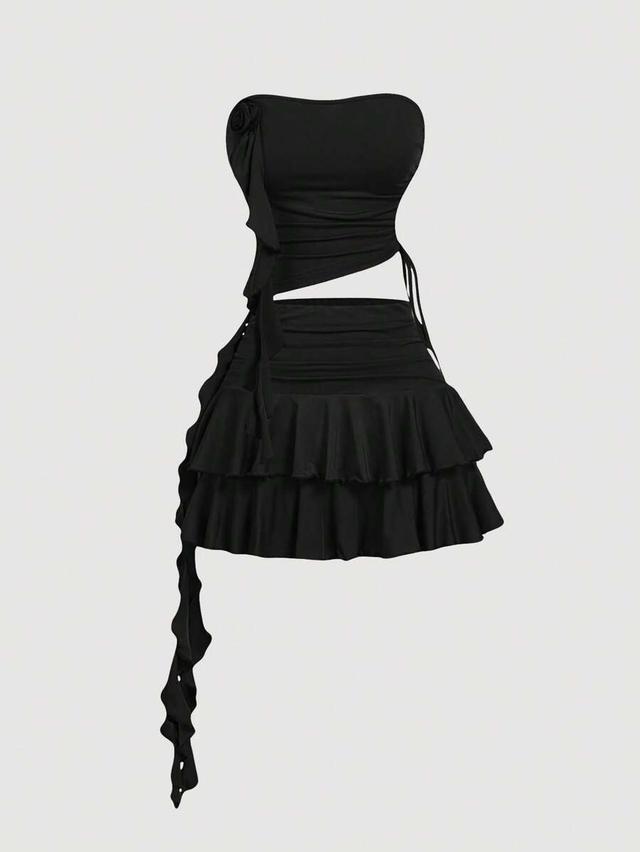 black ruched strapless mini dress with floral detail