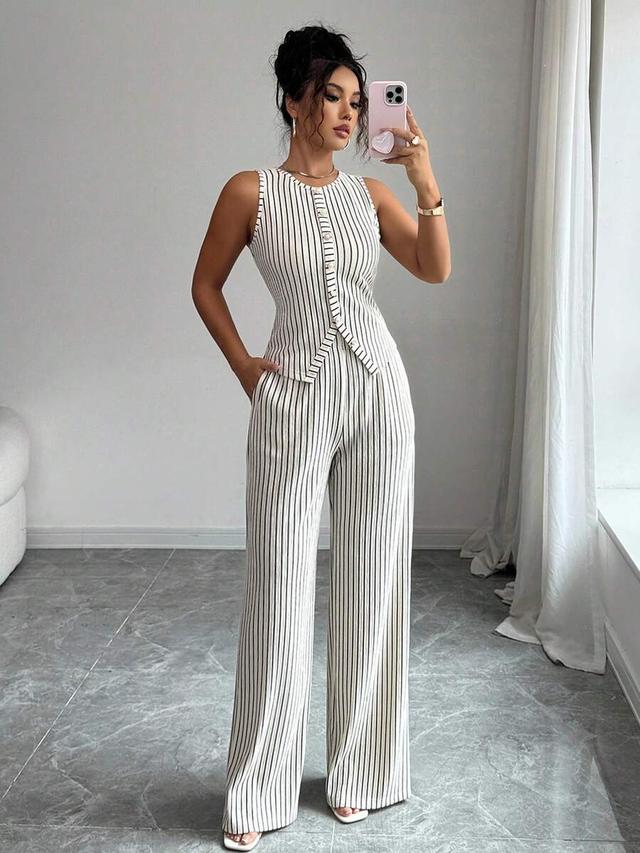 striped sleeveless buttoned tank top and straight leg trousers