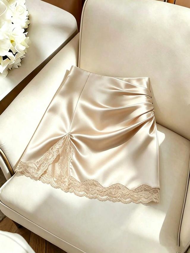 elegant champagne satin mini skirt with lace trim