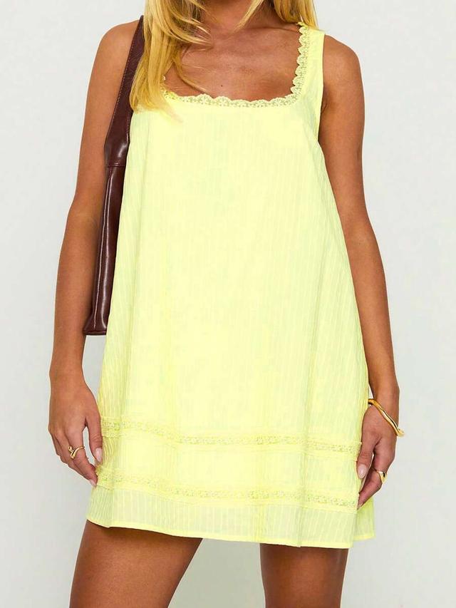 yellow textured cotton mini dress with lace trim