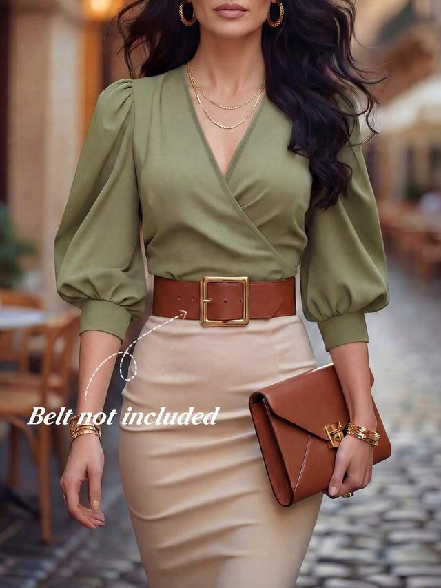green v-neck wrap top with bishop sleeves