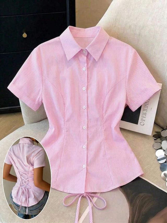 pink and white striped short sleeve waist cinching blouse