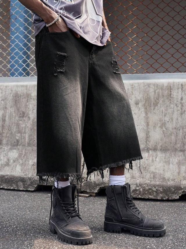 loose fit black denim shorts with frayed hem