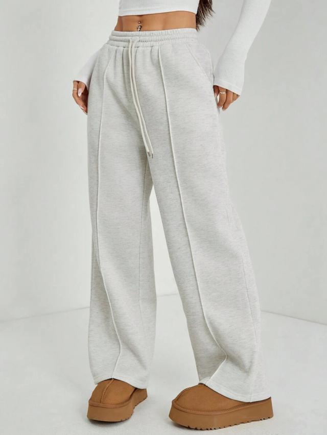 light grey straight-leg lounge sweatpants with center seams