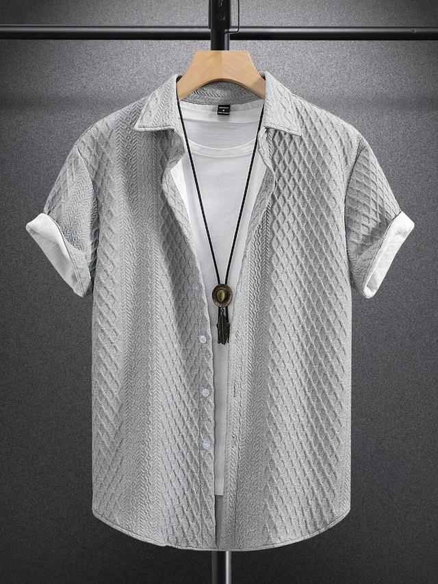 grey textured short sleeve button down shirt