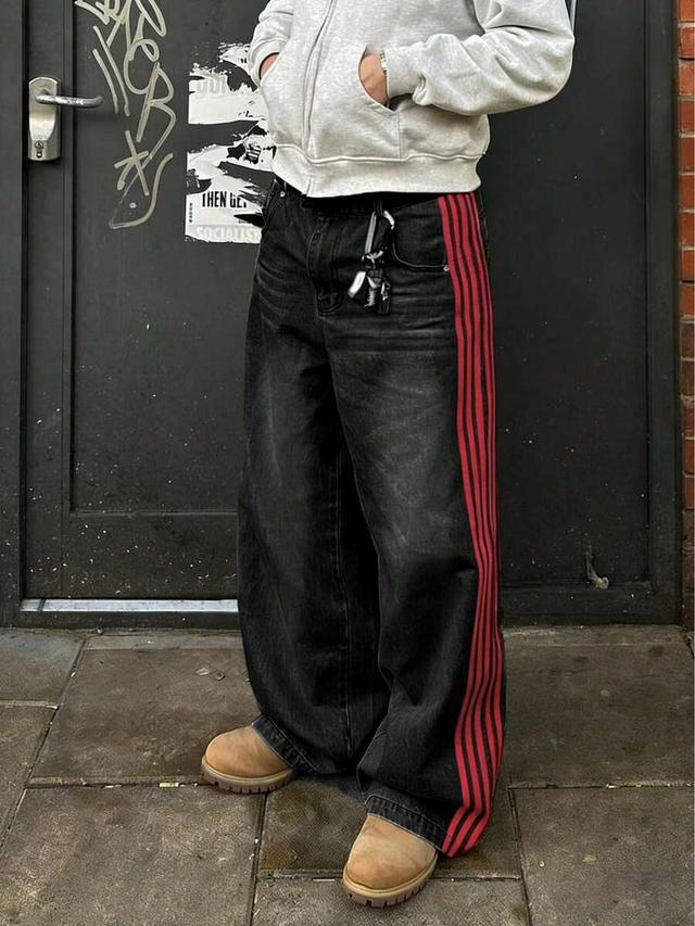 washed black denim loose fit jeans with side stripes