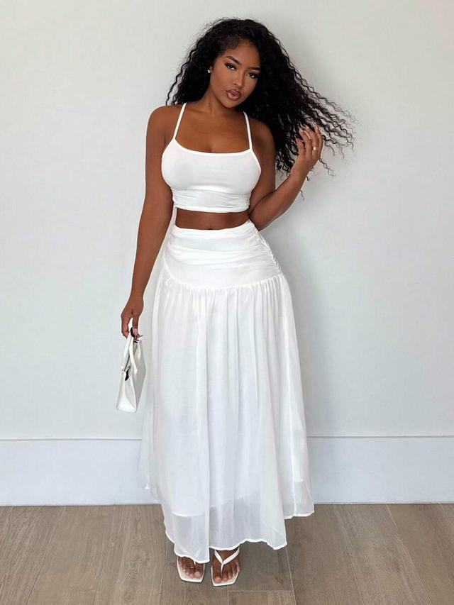 white chiffon flowy a-line pleated asymmetric long skirt