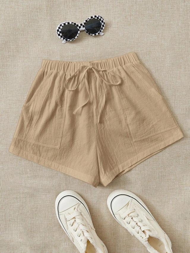 beige cotton tie waist slant pocket shorts