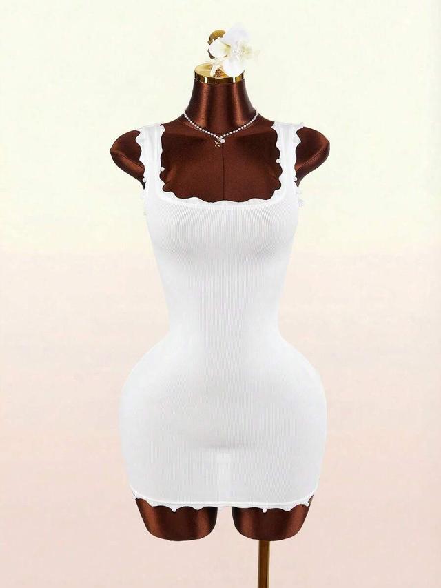 white ribbed bodycon mini dress with scalloped trim