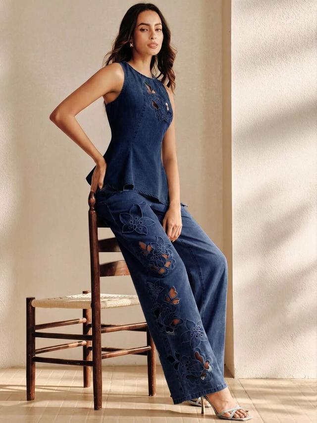 blue denim waist-cinching top with floral cutwork embroidery