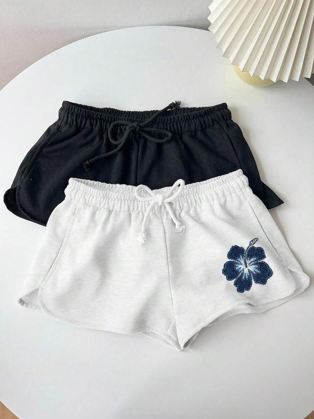 black textured hibiscus floral print drawstring elastic waist shorts