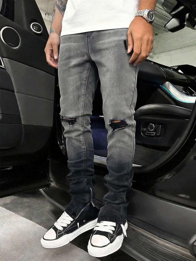 men's grey slim fit ripped jeans with zipper hem