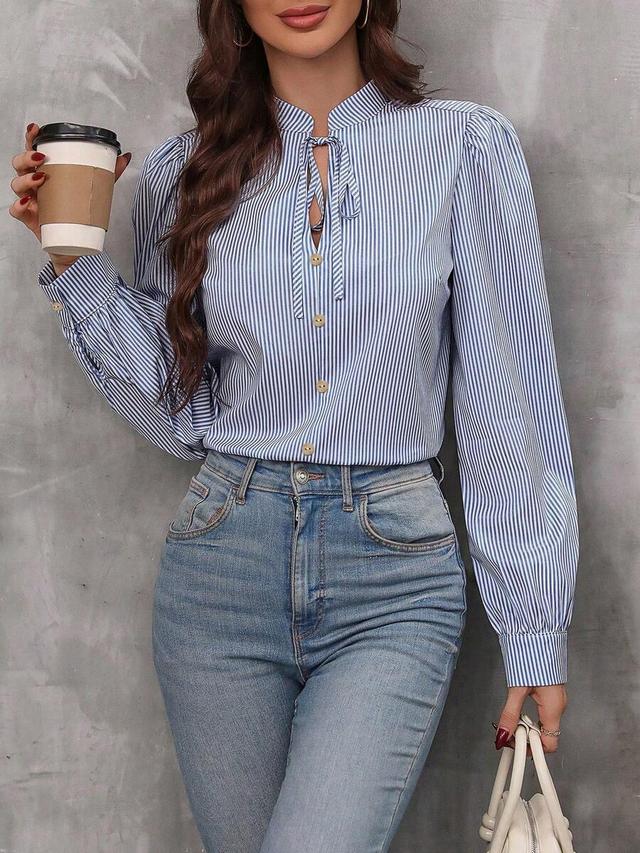 blue and white striped tie neck lantern sleeve blouse
