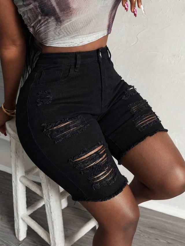 black distressed skinny denim shorts with frayed hem