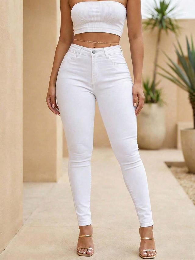 classic high-waisted white denim skinny jeans