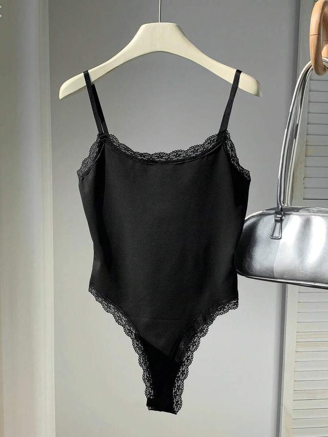 black lace trimmed spaghetti strap bodysuit