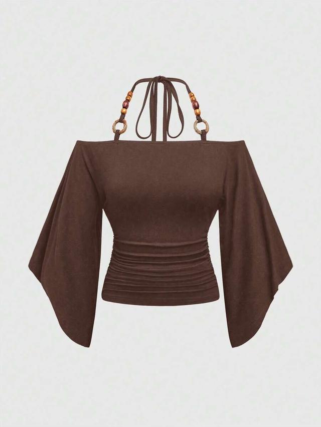 brown off-shoulder bat-wing sleeve top with wooden beads