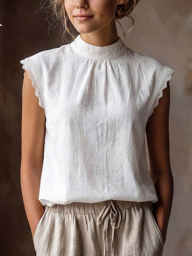 white casual mock neck sleeveless cotton blouse