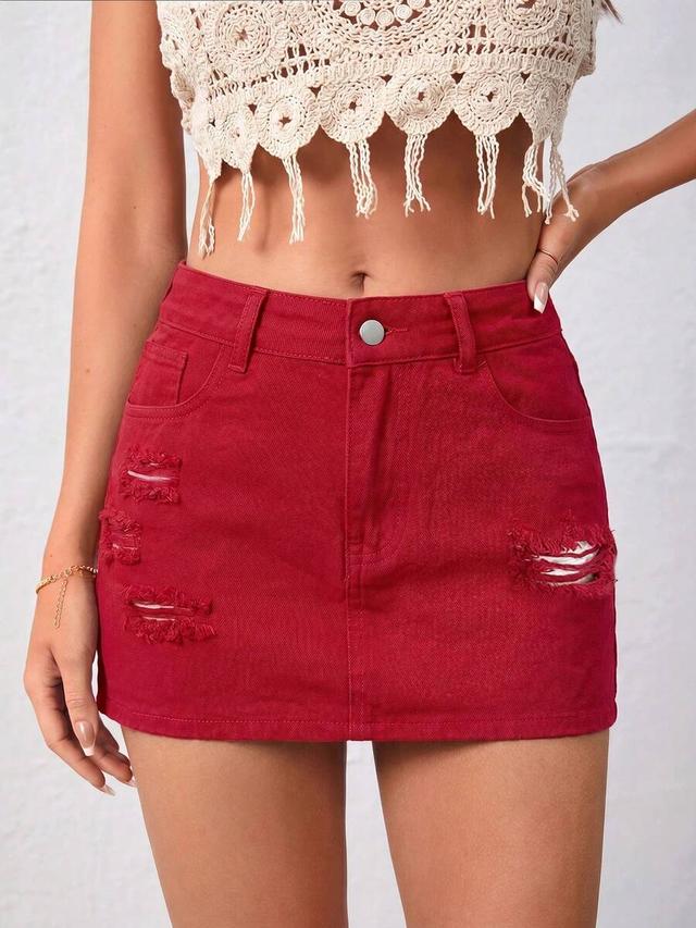 distressed red denim mini skirt