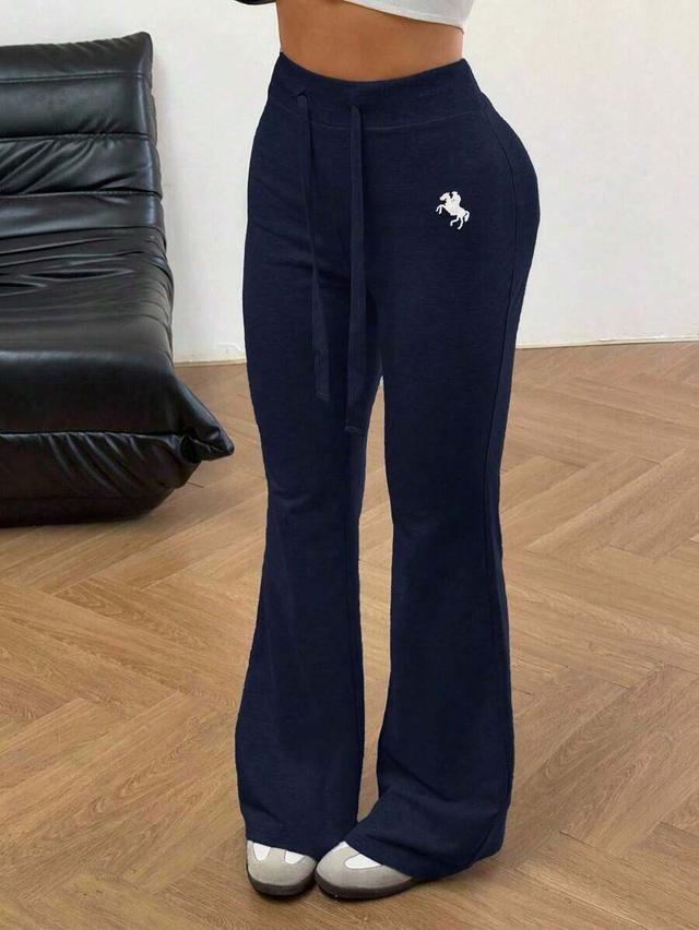 navy embroidered drawstring flare sweatpants