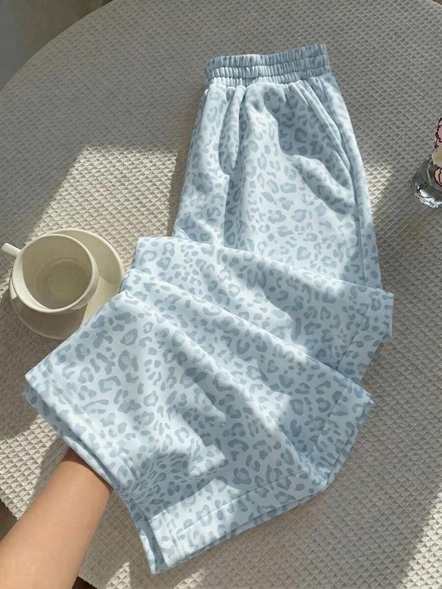 light blue camouflage leopard print loose-fitting trousers