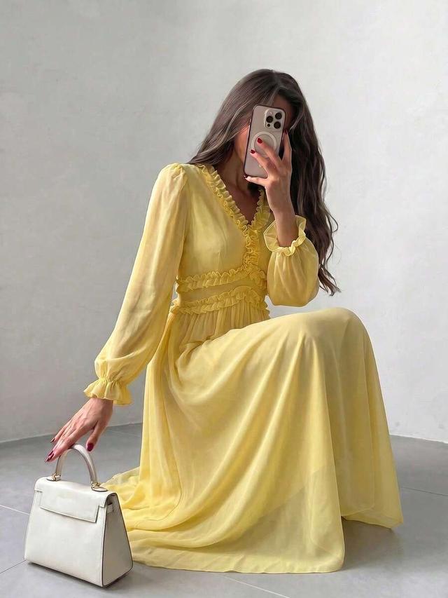 yellow woven long sleeve cinched waist wavy hem dress