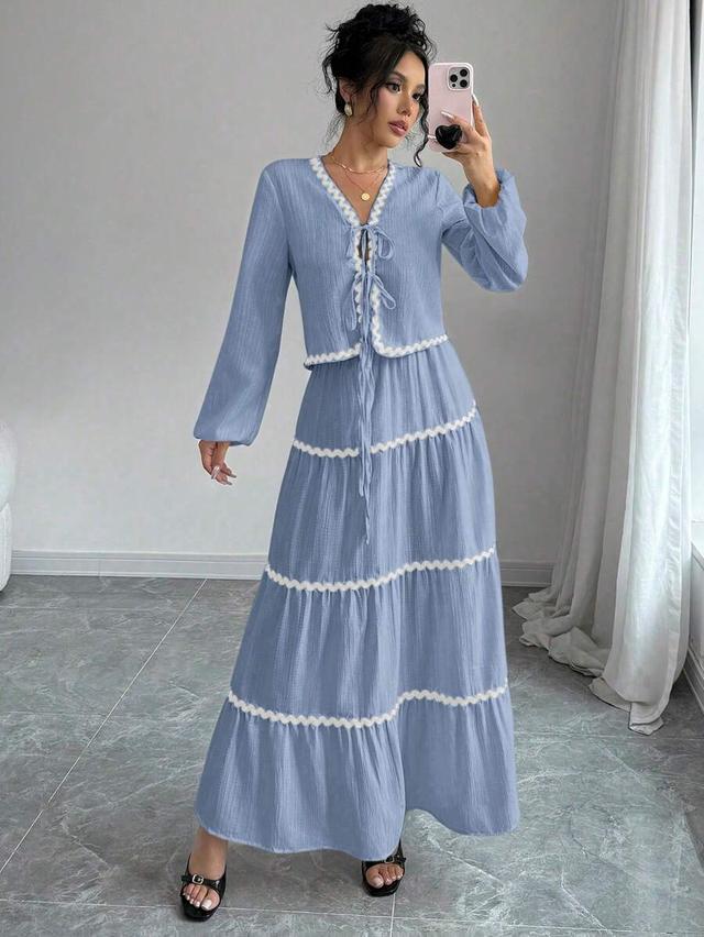 blue lantern sleeve blouse and tiered ruffle skirt set