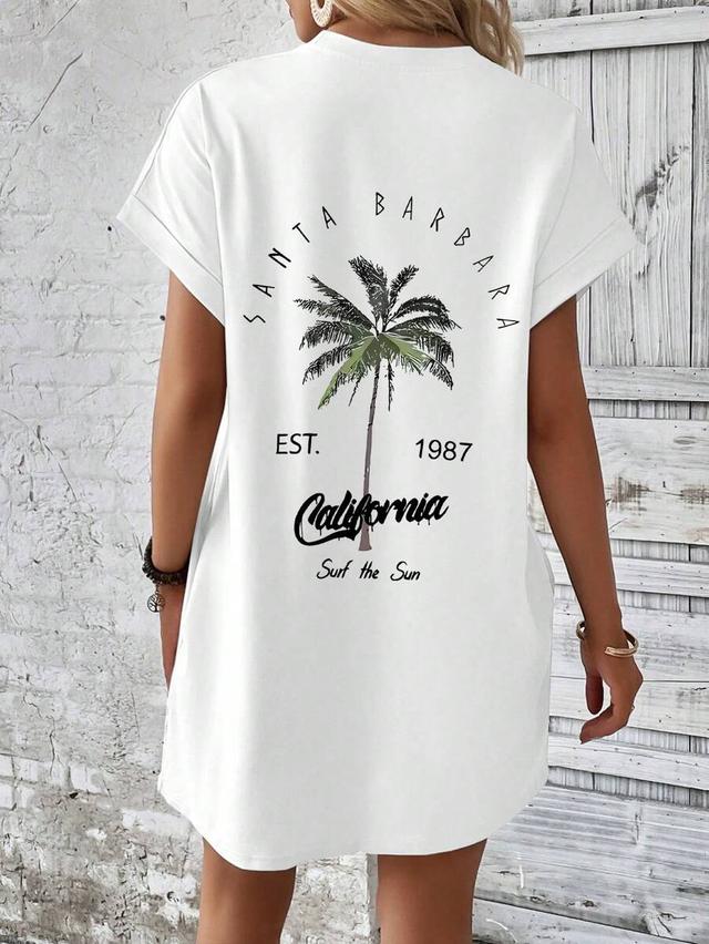 white cotton crew neck mini dress with palm print