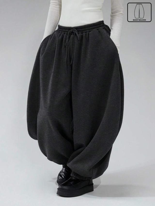 charcoal grey balloon leg sweatpants with elastic cuffs