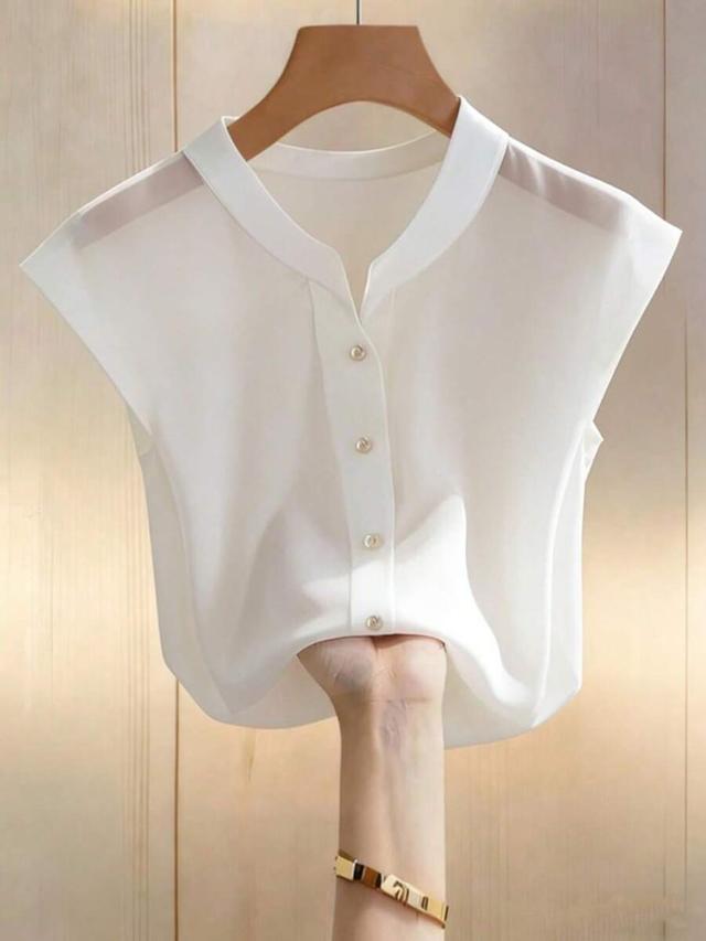 elegant white sleeveless chiffon button-down blouse