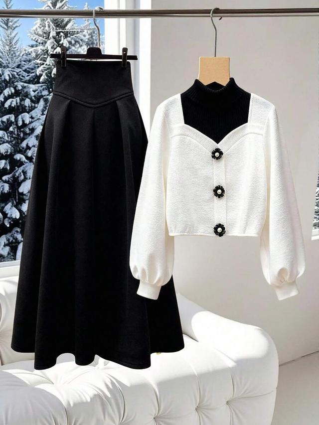 white elegant black high-waisted pleated midi skirt