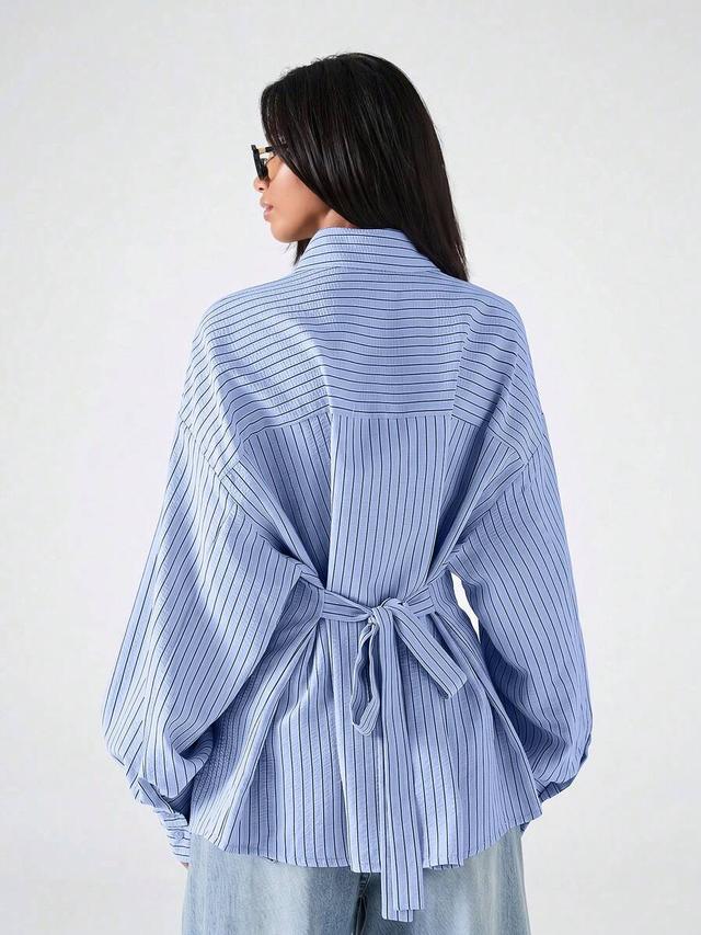 minimalist navy blue striped tie-front backless blouse