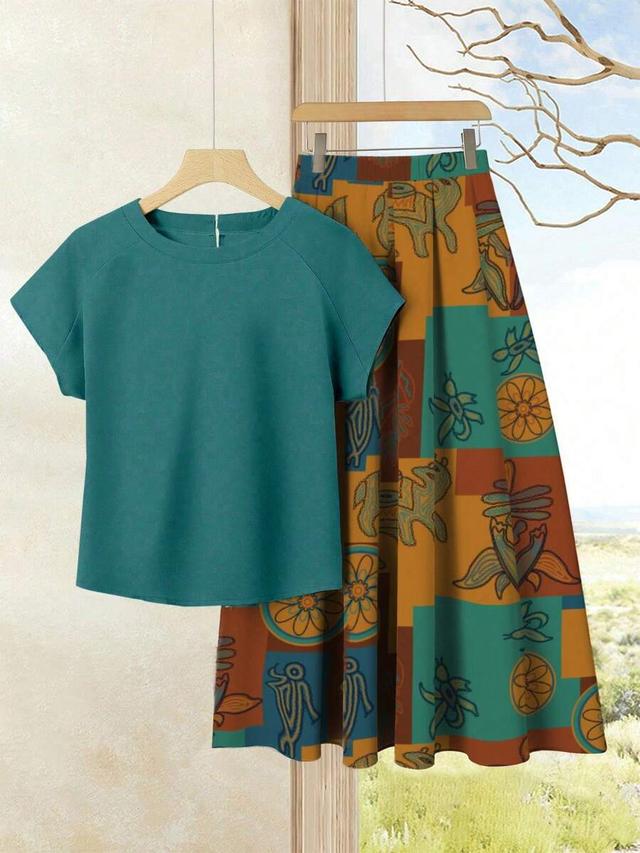multi print top and printed midi skirt set