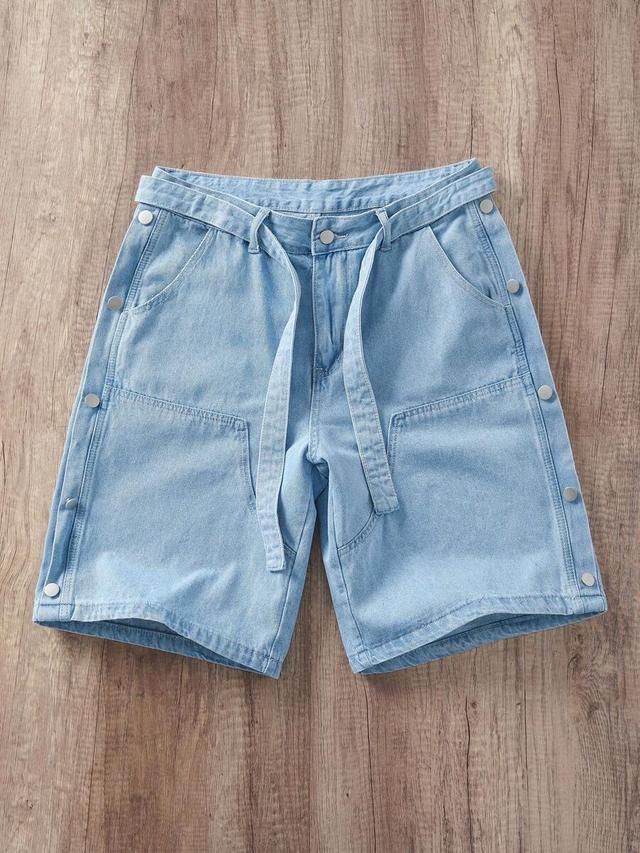 light wash denim patchwork shorts with side snap buttons